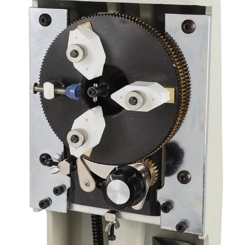 Close-up view of the engraving mechanism of the Slick Heavy Duty Ring Inner Engraver Stamper with Adjustable Letter Dial Tool for Jewelers.