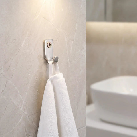 Heavy Duty Stainless Steel Picture Wall Mount Hooks Corrosion Resistant Drywall Brackets Built Like A Tank Worry Free Hanging For Big Frames And Mirrors Foolproof Install Design holding a white towel on a light marble wall.
