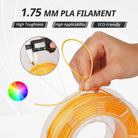 Top Shelf Silk PLA 3D Printer Filament 1.75mm Four Spool Bundle With Metallic Gold Silver Bronze And Red Copper Shades; hand holding filament