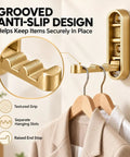 Grooved anti-slip design of Big Shot Heavy Duty Foldable Wall Hooks Built From Tough Zinc Alloy Featuring A Clean Gold Tone.