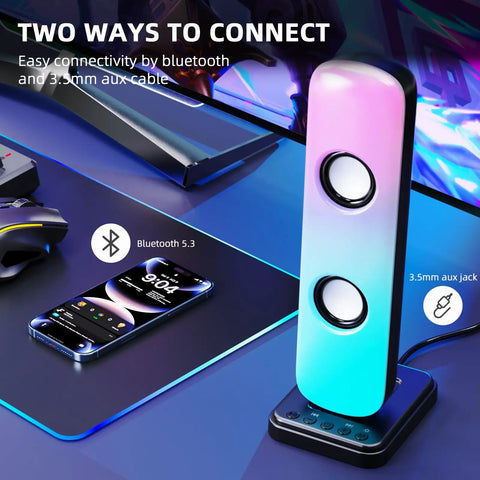 Desktop Computer Speaker Set With 20W HiFi Stereo Sound For Gaming Built In Bluetooth And 3.5mm Aux In RGB Lights on desk.