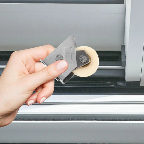 Top Shelf Stainless Steel Sliding Door Pulley Roller Adjustable 31-39mm Heavy Duty Window Wheel in hand for smooth patio door use.