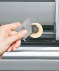 Top Shelf Stainless Steel Sliding Door Roller Featuring Adjustable Window Track Wheel shown in hand for easy installation.