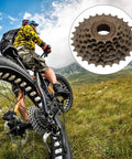 Cyclist on mountain trail with inset of Six Speed Freewheel 14T-28T Wear-Resistant Bicycle Cassette for Mountain Bike Replacement Sprocket Kit
