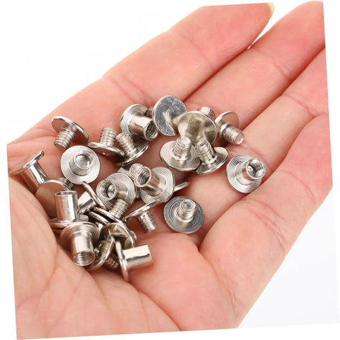 Carbon Steel Binding Screws And Scrapbook Post Fasteners For Photo Albums And Documents Silver Finish in hand, showcasing rust-proof design.