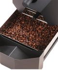 Commercial Automatic Coffee Bean Roaster With Smoke Filter And Nine Custom Baking Curves For Smooth Pro Level Roasts with roasted coffee beans.