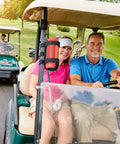 Rugged Portable Speaker Mount With Waterproof Strap for Bluetooth Speakers on golf cart, black, holding an orange speaker.