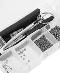 Ultimate Eyeglass Repair Kit Featuring Replaceable Nose Pads And Micro Screwdriver With Assorted Glasses Screws in a clear organizer.