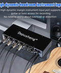 4-Channel USB Audio Interface With ASIO, 24-Bit 192 KHz Recording, 48V Phantom Power, connected to guitar cables on desk