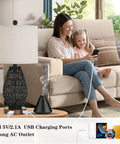 Touch Control Rattan Table Lamps Set Of 2 With 3 Way Dimming USB Ports And AC Outlet on a side table with a sofa in the background