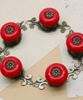 Dope Red Ceramic Cabinet Knobs For Dressers And Kitchen Drawers Solid Zinc Alloy Body Include Tight Screw Set, five knobs on decorative metal base.