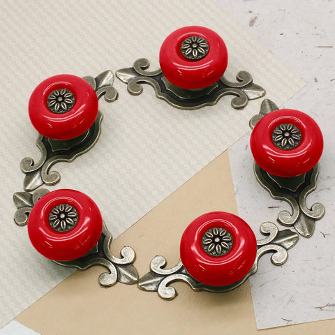 Dope Red Ceramic Cabinet Knobs For Dressers And Kitchen Drawers Solid Zinc Alloy Body Include Tight Screw Set, five knobs on decorative metal base.