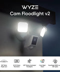 Outdoor Floodlight Security Camera 2K HD With Color Night Vision, 2800-Lumen LEDs, 160-Degree Wide View, mounted on a wall at night.