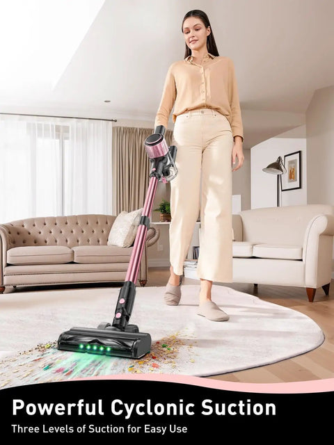User vacuuming a rug with Cordless Vacuum Cleaner 8 In 1 With Beastly 45KPa Suction, Lightweight And Easy To Use, in a living room.