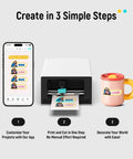 All In One Color Sticker Printer And Cutter For DIY Crafters And Custom Labels And Gifts With Thermal Dye Sublimation 300 DPI And Precise AI Auto Cutting next to smartphone and mug