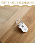 Thirty Pack Of Heavy Duty Double Wheel Curtain Track Rollers Made To Slide Like Butter On Overhead Ceiling Pulleys on wooden surface.