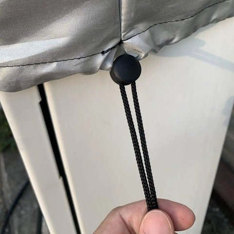 Close-up of adjustable drawstring on Heavy Duty Beefed Up Waterproof Charging Station Cover fending off snow and rain.