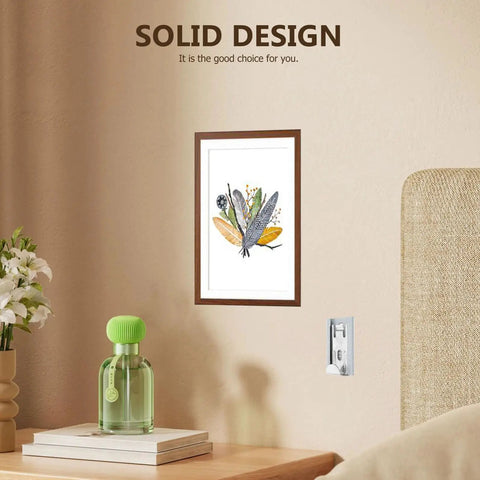 Heavy Duty Stainless Steel Picture Hangers Built Tough Wall Mount Brackets For Mirrors And Artwork Four Pack with framed art.