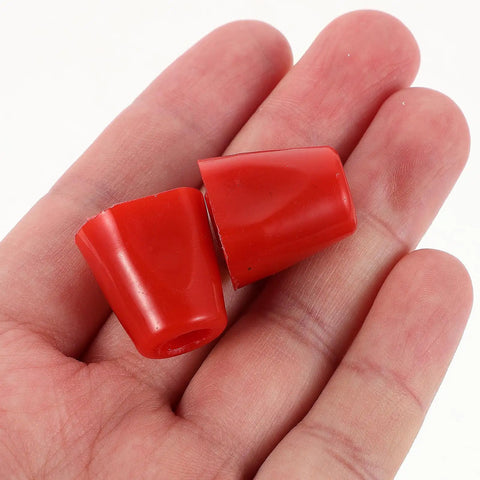 Fencing Replacement Nut Kit Two Pack For Training And Competitions red plastic components in hand, easy to install and remove.