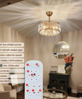 Crystal Caged Ceiling Fan With Light Remote Control 18 Inch Fandelier Chandelier in living room with remote and instructions.