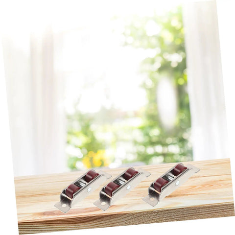 Heavy Duty Stainless Steel Sliding Window Sash Pulleys 4 Pack Double Roller Wheels on wood surface for window repair