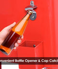 Person using bottle opener and cap catcher on 80 Quart Rolling Cooler Ice Chest With Wheels And Bottle Opener, Party Ready Portable Bar Cart in Red.