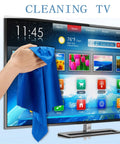 Blue microfiber cleaning cloth wiping a flat-screen TV screen; 12 x 12 inch cloth for electronics.