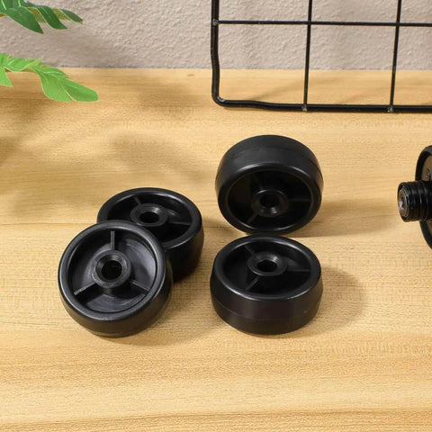 4 Pack Treadmill Wheels Replacement Universal Caster Rollers For Exercise Bikes And Fitness Gear High Mobility Easy Relocation Parts on a wooden surface.