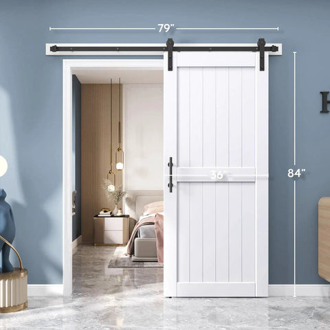 Slick White Barn Door With Solid Wood Core And Waterproof Vinyl Panel Including H Frame Sliding Hardware Kit Plus Handle installed in a modern interior.