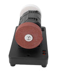 No Nonsense Plug Free Mini Bench Grinder Featuring Dual Grinding Wheels Variable Speed Dial And Heavy Duty Shock Absorption for precise metalwork.