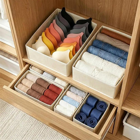 Kick Clutter To The Curb With This Slick Foldable Drawer Organizer Set Of Six Beige Fabric Compartments with bras and rolled clothes.