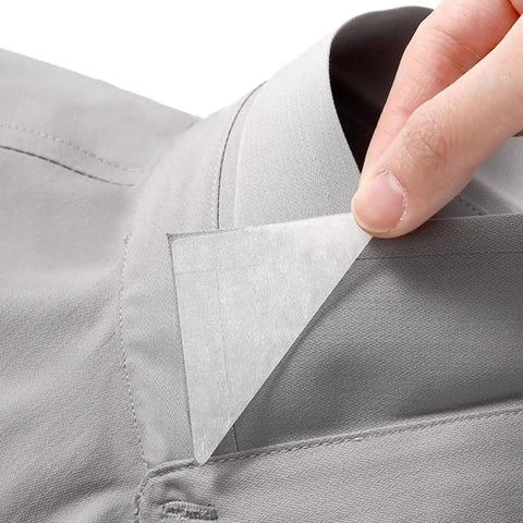 Premium White PVC Adhesive Collar Stays 240 Pack Shirt Collar Protectors For Men Dress Shirts applied to a gray dress shirt collar.