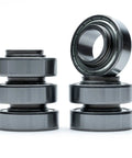 Badass 6-Pack C3 Spindle Rebuild Bearings Loaded With High Temp Synthetic Grease For Smoother Than Butter Rotation And Ridiculous Wear Resistance On Lawnmower Decks stacked display against white background.
