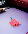 Heavy Duty Automatic Car Fire Extinguisher With Sticky Self Adhesive Patch For Quick Dash Install and Fast Engine Bay Fire Knockout In Rvs Trailers Or Daily Driver Trucks on dashboard.