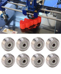 Top Shelf 13 Piece V Groove Guide Pulley Kit Featuring Heavy Duty Stainless Steel Bearings, 8 steel bearings on a table.