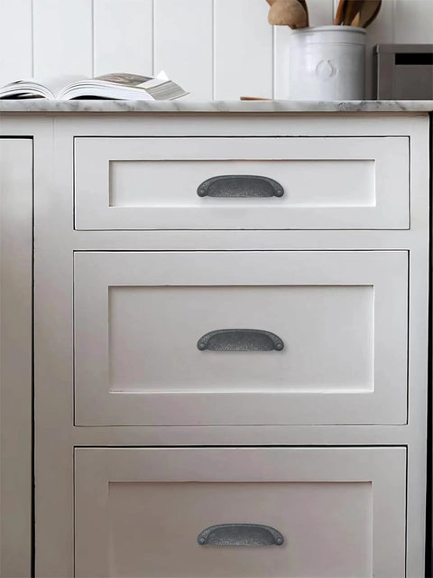 Solid As A Rock 10 Pack Rustic Cup Pulls In Matte Black Iron on white kitchen drawers with three inch hole centers.