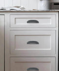 Top Shelf Rustic Cup Pulls 2 Pack Black Iron Vintage Farmhouse Kitchen Cabinet Handles 96mm Hole Center on white cabinets.