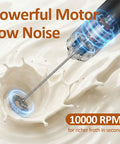 Rechargeable Milk Frother Handheld Electric Coffee Mixer Wand On The Go With Stainless Steel Whisk creating froth in milk