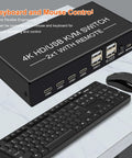 4K HDMI KVM Switch For Dual Computers Seamlessly Share One Monitor With USB 3.0 Hub showing USB ports and connected keyboard and mouse.