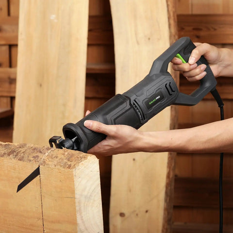 Heavy Duty Corded Reciprocating Saw 120V With 6.0 Amp Motor And 2800 RPM cutting through wooden beam at worksite.
