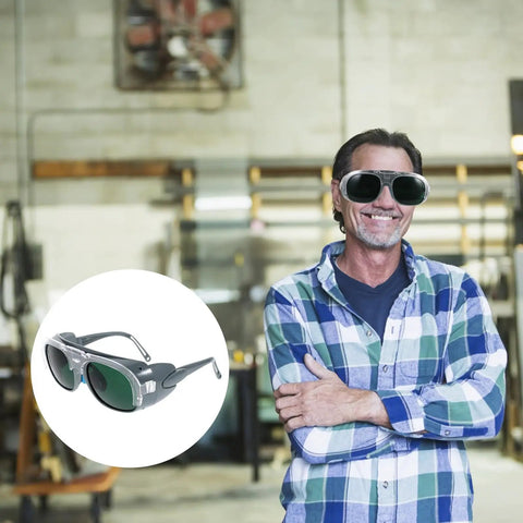 Man wearing Two Piece Electric Welding Glasses And Tough As Nails Safety Goggles Featuring A Scratch Resistant Coating in workshop.