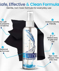 Purity Eyeglass Lens Cleaner spray bottle with blue label and spray nozzle; microfiber cleaning cloths in background.