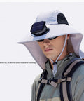 Solar Powered Fan Hat With Detachable USB Solar Power, Wide Brim Sun Shield, adjustable fit, shown on model outdoors
