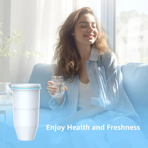 Woman enjoying water with ZeroWater Compatible Water Filter Pitcher And Dispenser Multi Stage System That Cuts Chlorine PFOA PFOS And TDS For Crystal Clear Tap Water 2 Pack Great Value next to her on a couch
