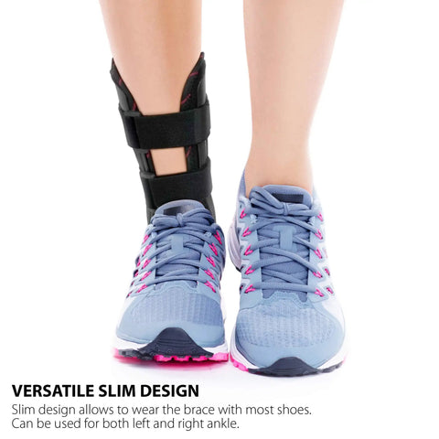 All Day Ankle Stabilizer Brace With Stirrup Support on left foot, showing black breathable design with shoe.