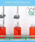 Double Head Automatic Bottle Filler Machine With Conveyor Belt filling red liquid into bottles with double-end discharge port.