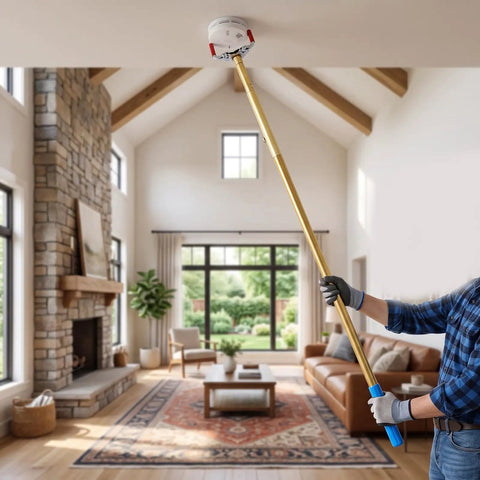 Heavy Duty Smoke Detector Removal Extension Tool For High Ceilings Vaulted Rooms Two Story Entryways in use to reach a smoke detector.