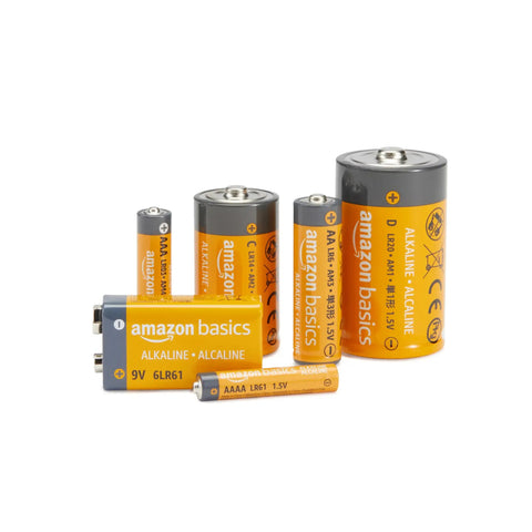 Heavy Duty 20 Count Aaa Alkaline Batteries Bring Serious Juice With Absolute Zero Leakage And A Ten Year Shelf Life To Fully Run Your Game Controllers Remotes Flashlights Toys And Emergency Gear All Day Long. Various sizes of alkaline batteries from Amazon Basics arranged together.