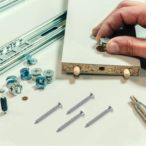Heavy Duty Wall Anchors And Screws Kit, 50 Sets, Stainless Steel And Plastic Construction for assembly, shown with a hand fixing a panel