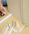 Drywall Anchors Kit With Plastic Expansion Tubes And Screws 50 Heavy Duty Sets Made From Stainless Steel in use on wood surface